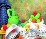 美国街头卖艺的魔术师将名画变气球
